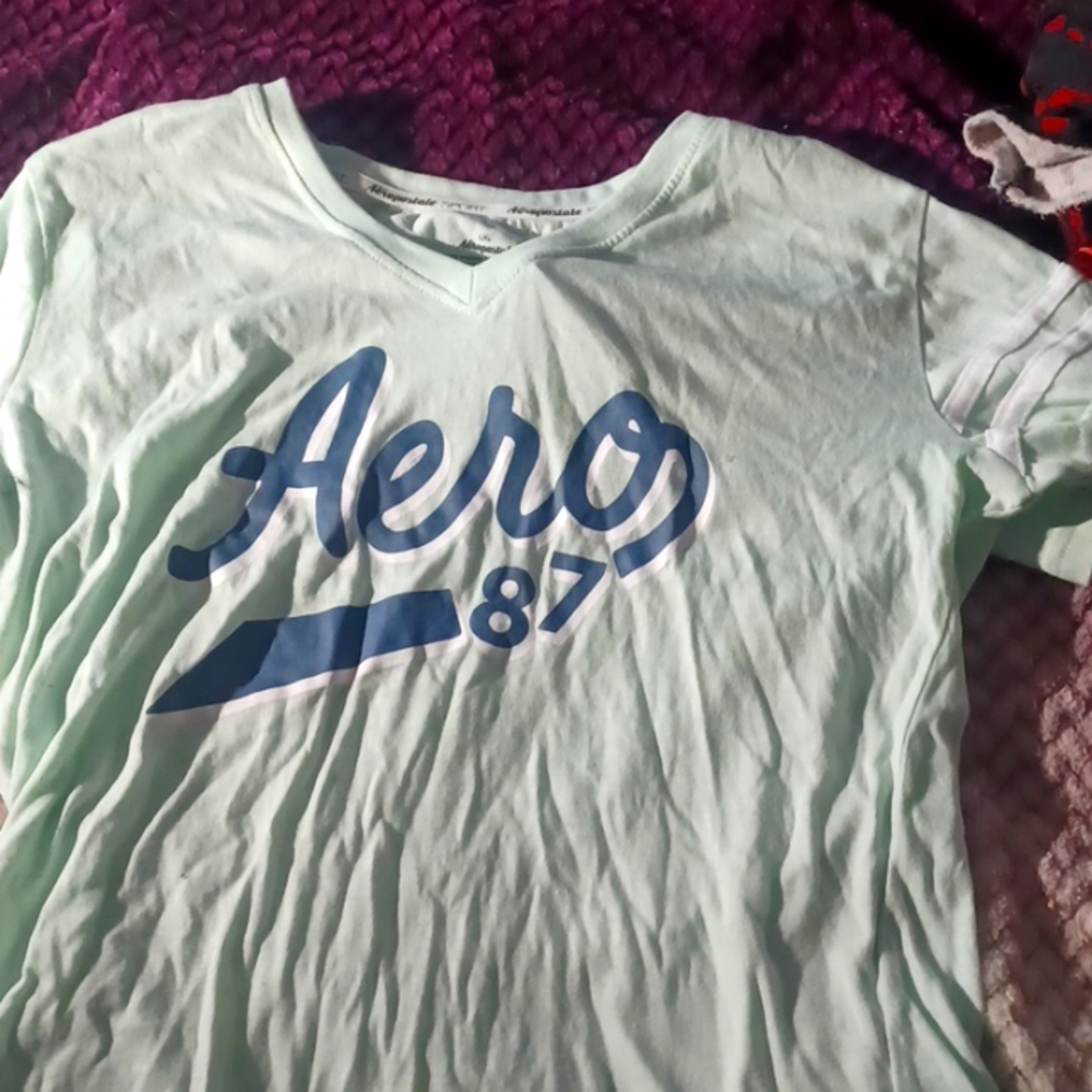 mint short-sleeved shirt